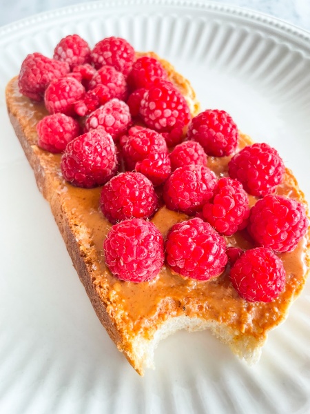 peanut butter and fresh raspberry toast